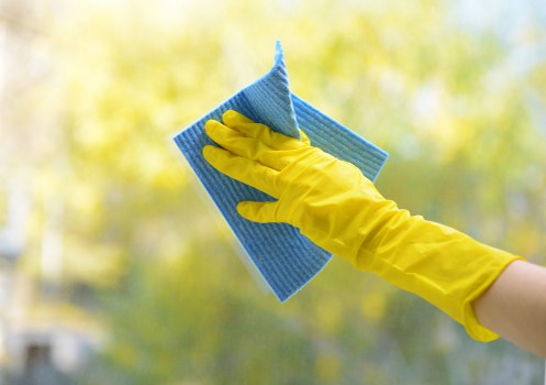 Acton cleaning service team tidying a bright office space